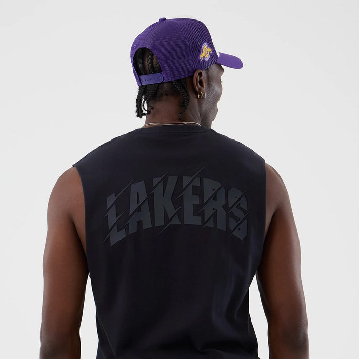 The model is wearing this NBA Core Plus LA Lakers Vest in navy. 7
