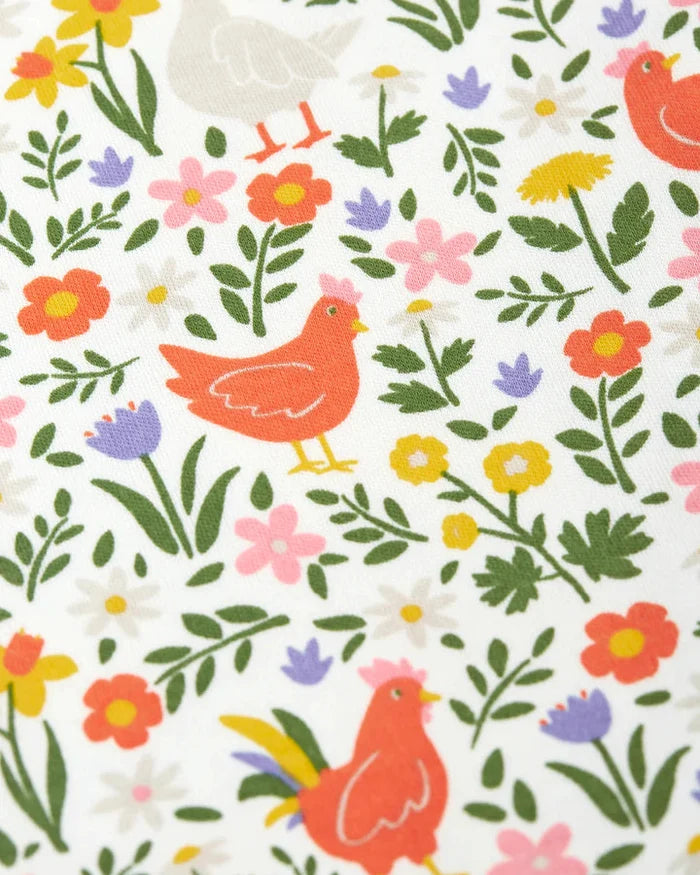 Pattern of colorful chickens and flowers on a white background