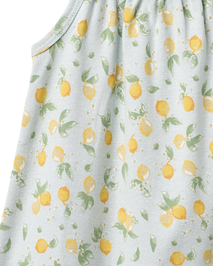 Fabric with lemon pattern on a light blue background