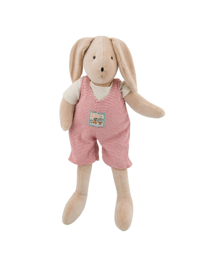 A plush stuffed bunny doll with long tan ears and legs, wearing pink-and-white striped overalls over a cream shirt, photographed on a plain white background.