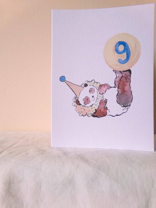 Illustration of a clown with a balloon number 9 on a white background