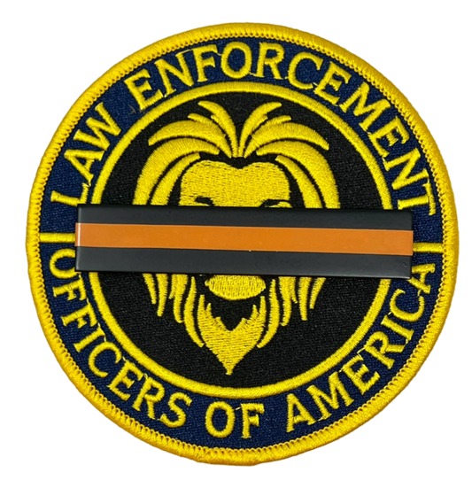 top Gun Violence Wear Orange Awareness / Mourning Bar for covering law enforcement, firefighter, EMS, agents, officers and other uniform patches and badges. 3" x 5/8" Wear Orange for Stop Gun Violence Awareness J288-SGV Black/Orange/Black Metal Mourning Bar with Orange Band that has 2 F9 nails (5/16" long) with clutch back attachments. Best worn over a badge patch that is on a shirt.