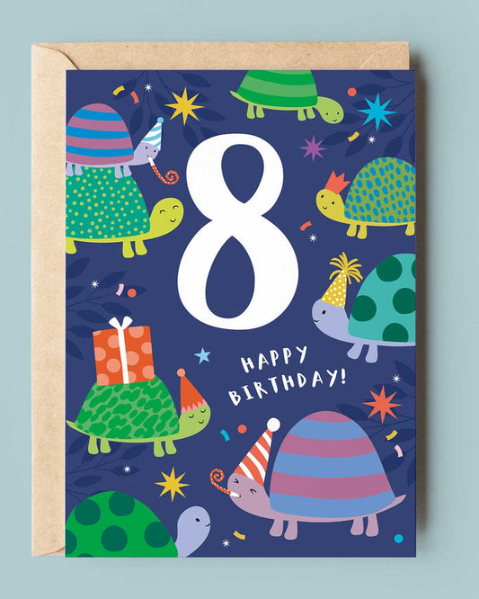 Children's birthday card with turtles and number 8 on a blue background