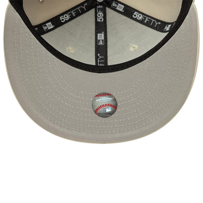 Pictured is this MLB Atlanta Braves 59FIFTY Fitted cap in cream. 2