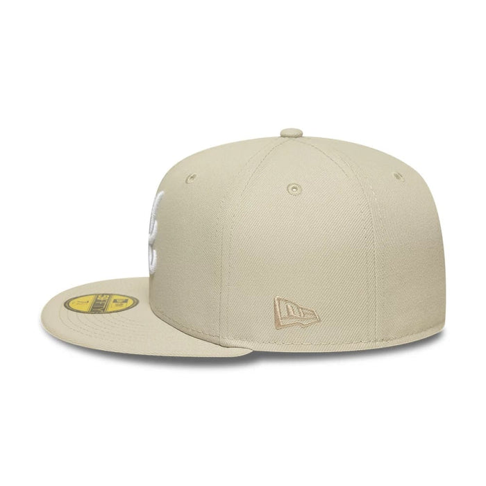Pictured is this MLB Atlanta Braves 59FIFTY Fitted cap in cream. 6