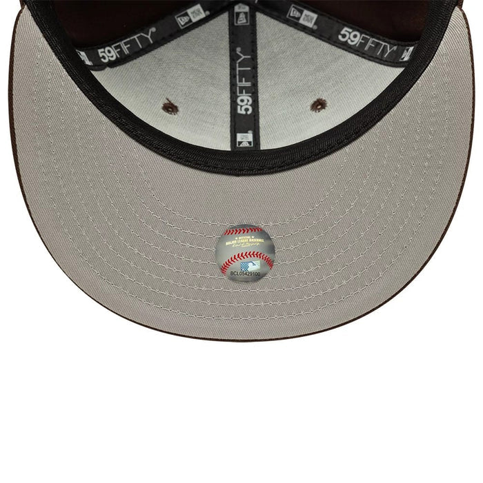 Pictured is this MLB Atlanta Braves 59FIFTY Fitted cap in dark brown. 2