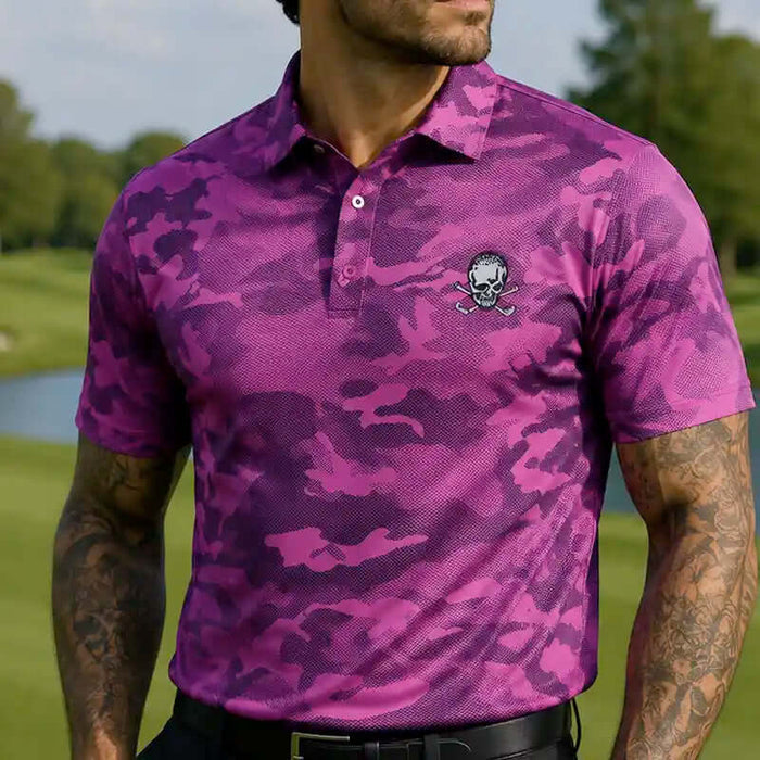 golfer wearing a purple camouflage golf polo shirt with a skull design on a golf course.