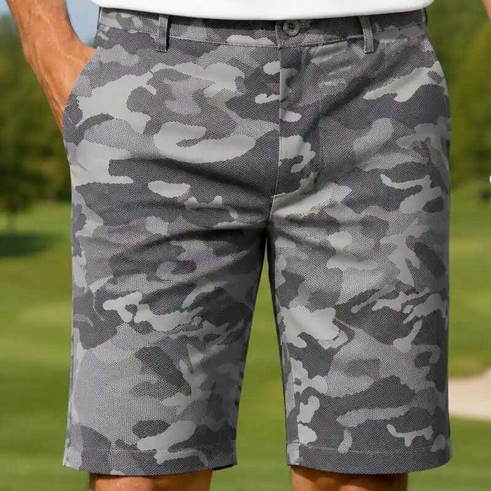 Camouflage grey golf shorts worn by a golfer on a golf course