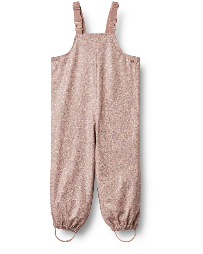 Pink floral overalls on a white background
