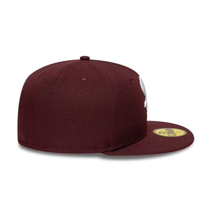 Pictured is this MLB Chicago White Sox 59FIFTY Fitted cap in dark purple. 7