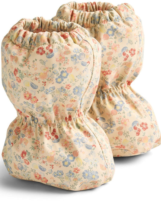 Two floral-patterned drawstring bags on a white background