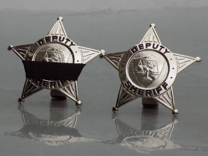 two Deputy Sheriff 5 point star Blackinton sil-tone badges with lion on scales of justice seal wOne badge shrouded with a Badgeart 1/2 inch mourning band