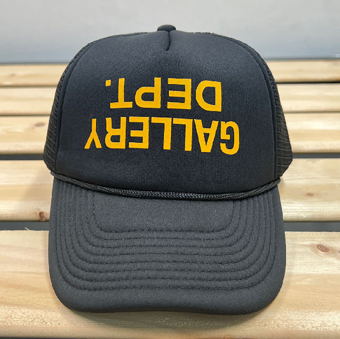 Black and yellow inverted logo
