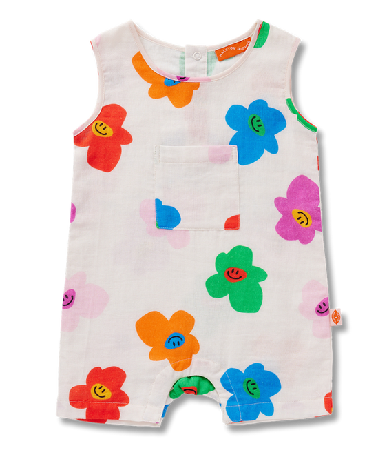Colorful children's romper with floral patterns on a white background