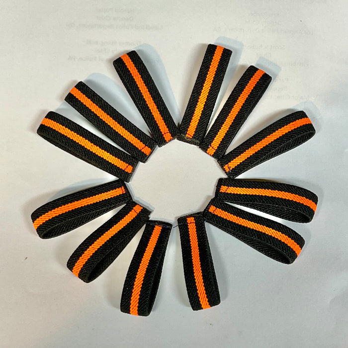 The Stop Gun Violence Wear Orange Awareness / Thin Orange Line Mourning Bands with a thin orange line mourning band 1/2". Band reverses to an all-black mourning band. Public safety officers are wearing thin orange line badge shrouds to raise awareness of gun violence in the community and among police officers, firefighters, Emergency Medical Services and others. Join us in the champagne to Stop Gun Violence. Badges not included.