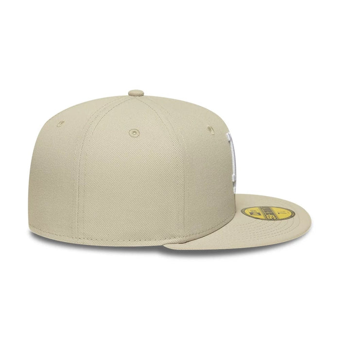 Pictured is this MLB LA Dodgers 59FIFTY Fitted cap in beige. 7