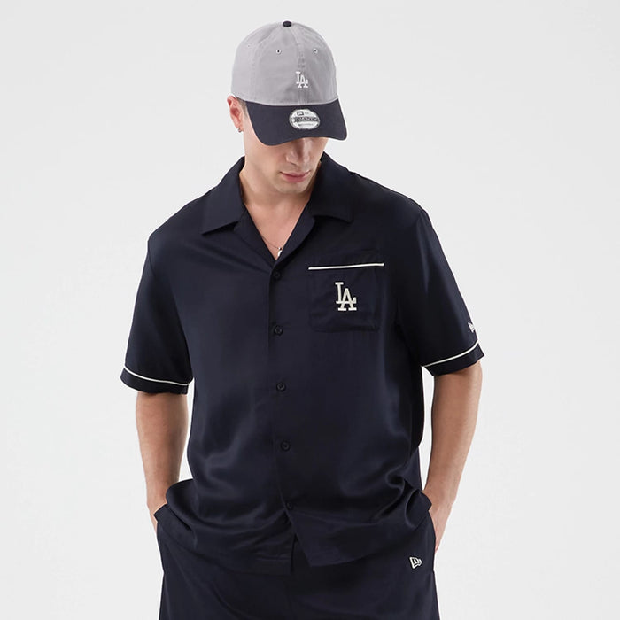 The model is wearing this MLB Graphic Revere LA Dodgers Short Sleeve Shirt in navy. 3