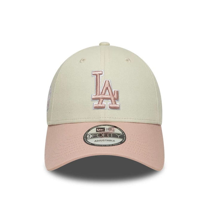 Pictured is this MLB World Series Patch LA Dodgers 9FORTY cap in light beige. 2