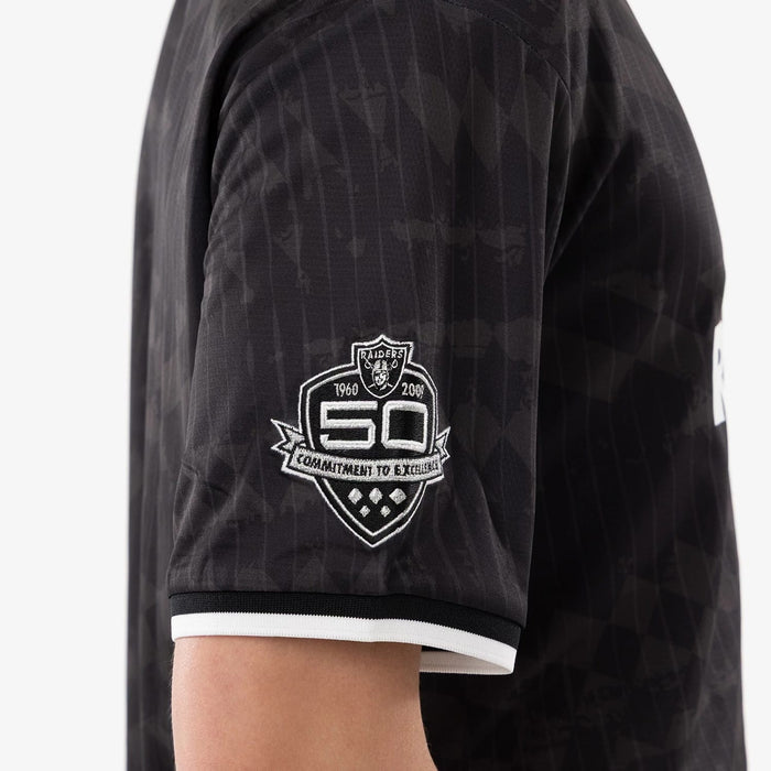 The model is wearing this NFL Las Vegas Raiders Soccer Jersey in black. 5