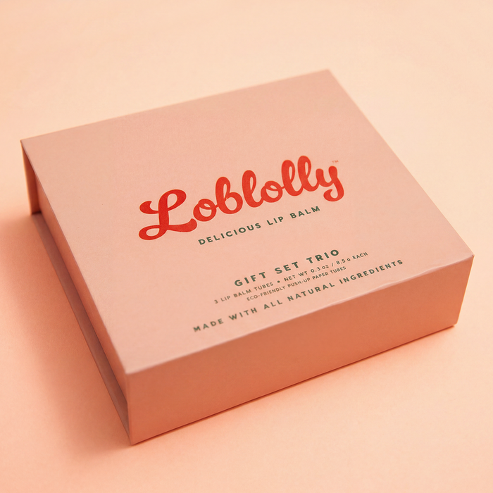 Lobolly all-natural lip balm gift set featuring three fruity lip balms in an open pink magnetic gift box