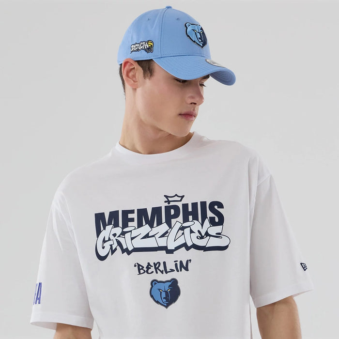The model is wearing this NBA Berlin Game 2026 Memphis Grizzlies Oversized T-Shirt in white. 6