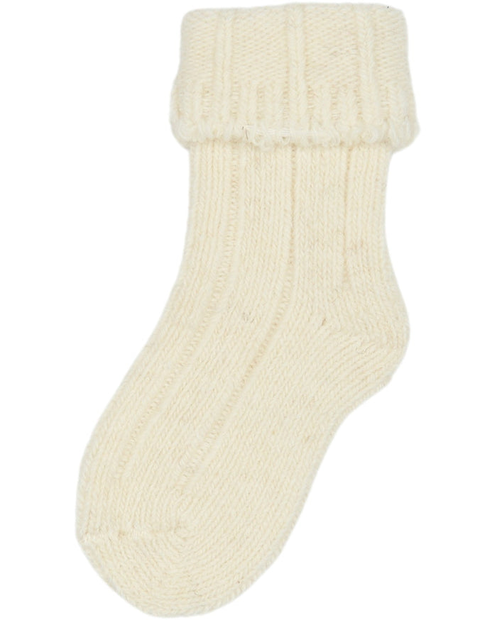 Cream-colored sock on a white background