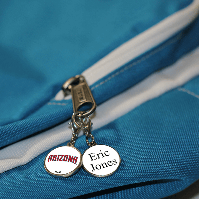 Zipper tags on a bag.