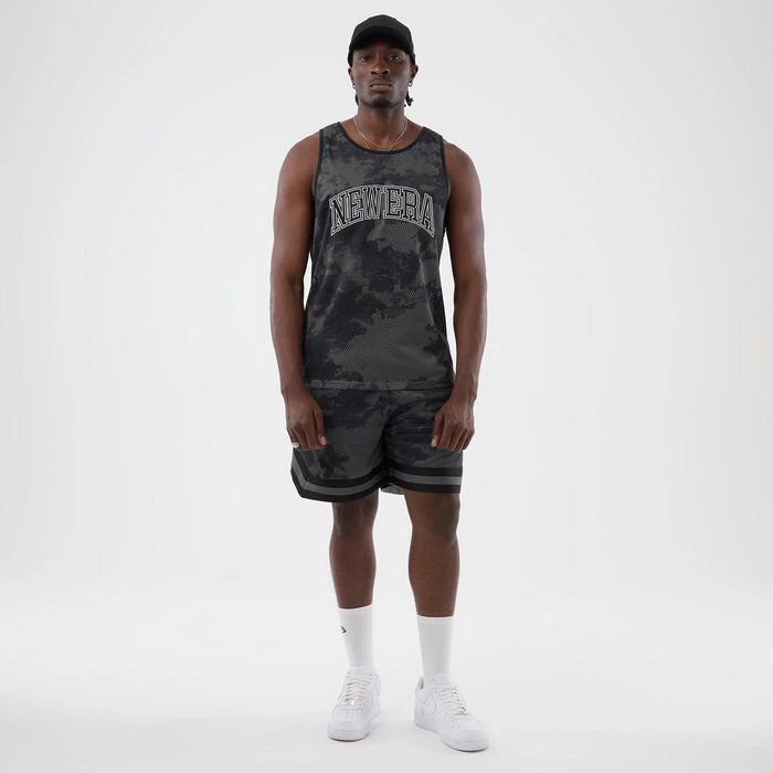 The model is wearing this New Era All Over Print Mesh Shorts in black camo. 7