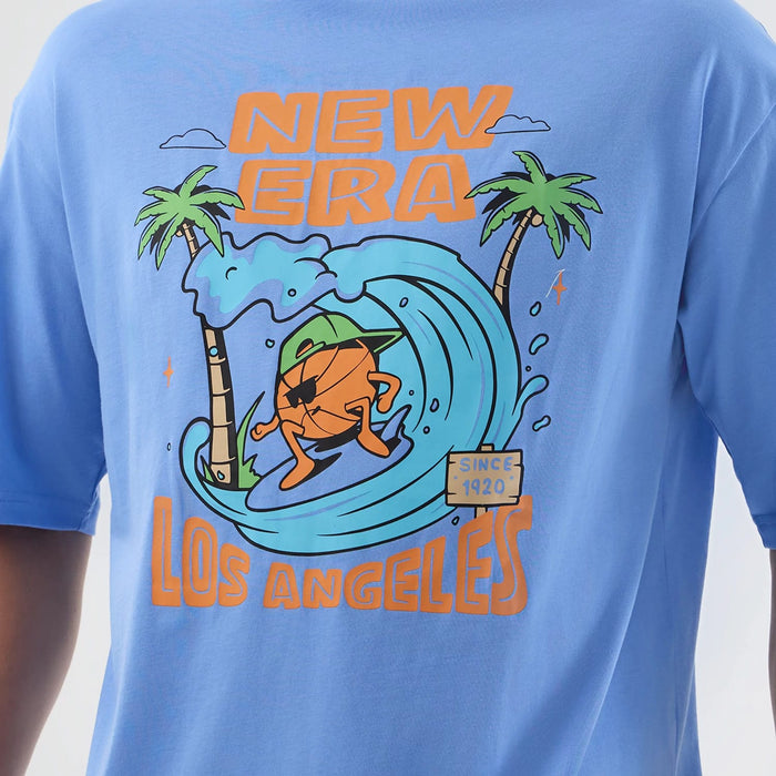 The model is wearing this New Era Basketball Character Graphic T-Shirt in pastel blue. 5