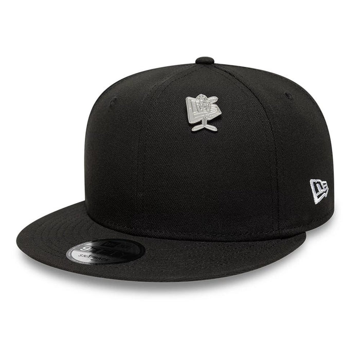 Pictured is this New Era Flag Character Pin Badge in silver. 2