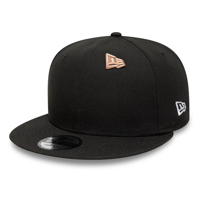 Pictured is this New Era Flag Rose Gold Pin Badge in rose gold. 2