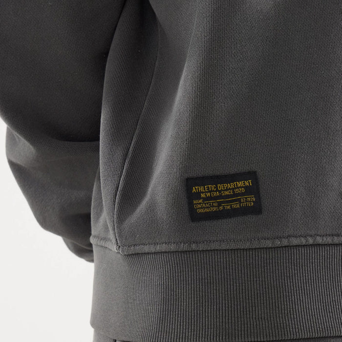The model is wearing this New Era Originators Crew Neck Sweater in black. 4
