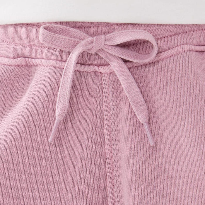 The model is wearing this New Era Originators Oversized Shorts in pink. 3