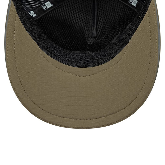 Pictured is this New Era Performance 9FORTY M-Crown A-Frame Trucker cap in green. 5