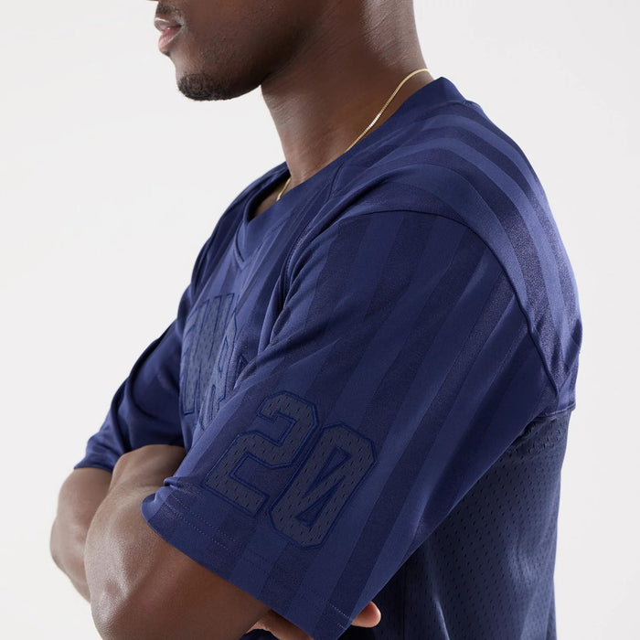 The model is wearing this New Era Street Archived Mesh Jersey in navy. 5