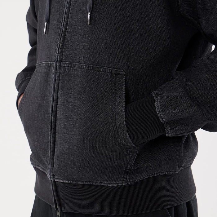 The model is wearing this New Era Washed Full Zip Hoodie in black. 5
