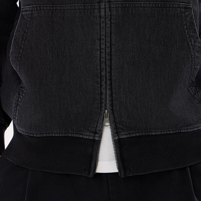 The model is wearing this New Era Washed Full Zip Hoodie in black. 6