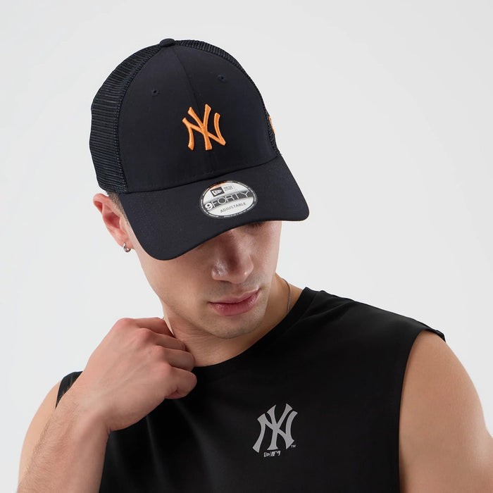 The model is wearing this MLB Core Plus New York Yankees Vest in black. 6