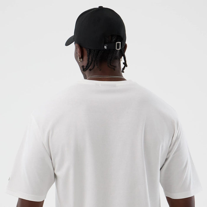 The model is wearing this MLB Icon Graphic New York Yankees T-Shirt in white. 7
