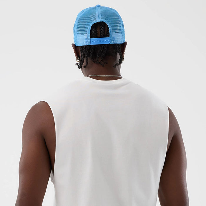 The model is wearing this MLB League Essential New York Yankees Vest in white. 7