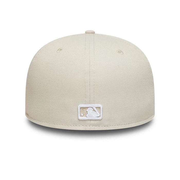 Pictured is this MLB New York Yankees 59FIFTY Fitted cap in light beige. 5