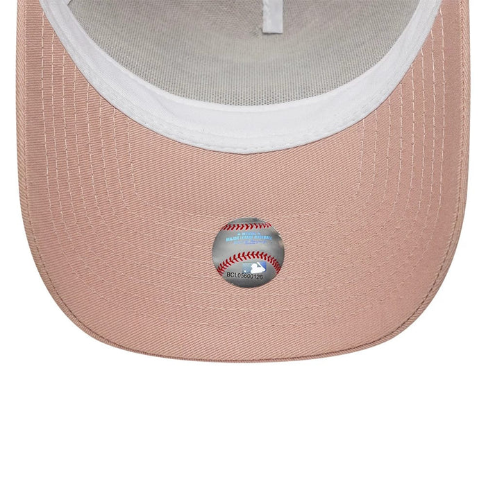 Pictured is this MLB Outline New York Yankees 9FORTY E-Frame Trucker cap in pastel pink. 5