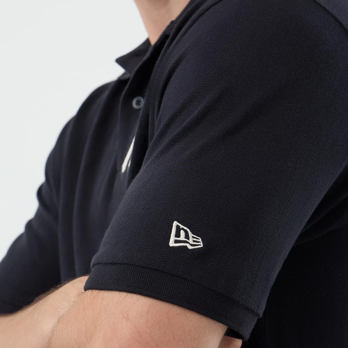 The model is wearing this MLB Rib New York Yankees Polo T-Shirt in navy. 5