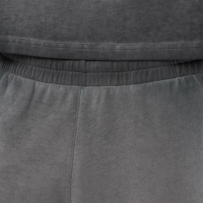 The model is wearing this MLB Washed Logo New York Yankees Shorts in black. 5
