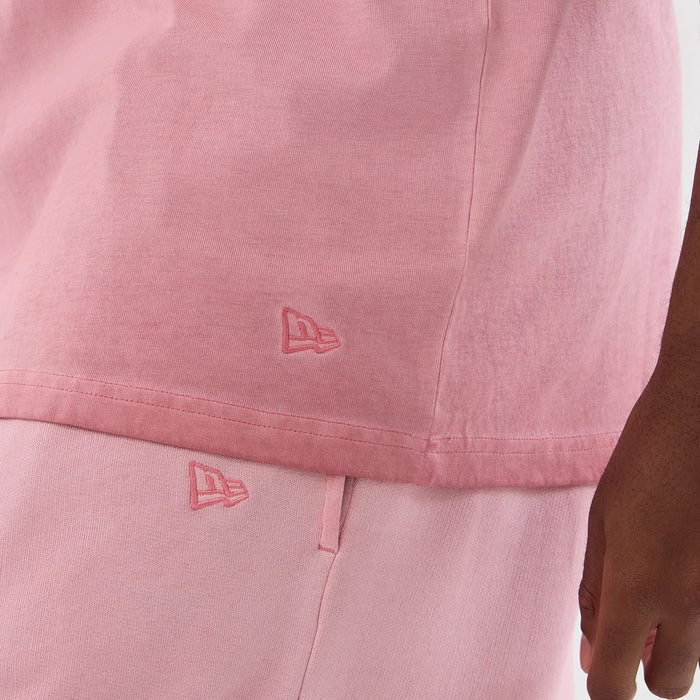 The model is wearing this MLB Washed Logo New York Yankees Vest in pastel pink. 7