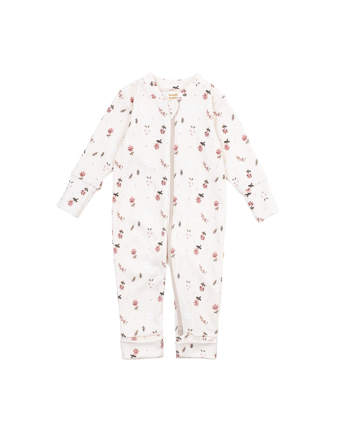 Floral-patterned baby onesie on a white background