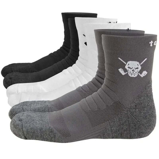Three pairs of athletic socks with a skull and crossed clubs design on the instep, available in black, white, and gray colors.