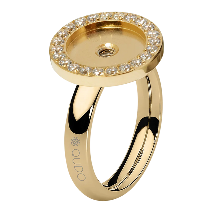 Gold ring with diamond-studded top on a white background