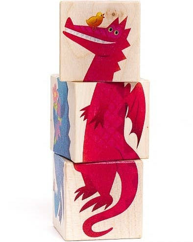 Stack of wooden blocks with colorful animal illustrations on a white background