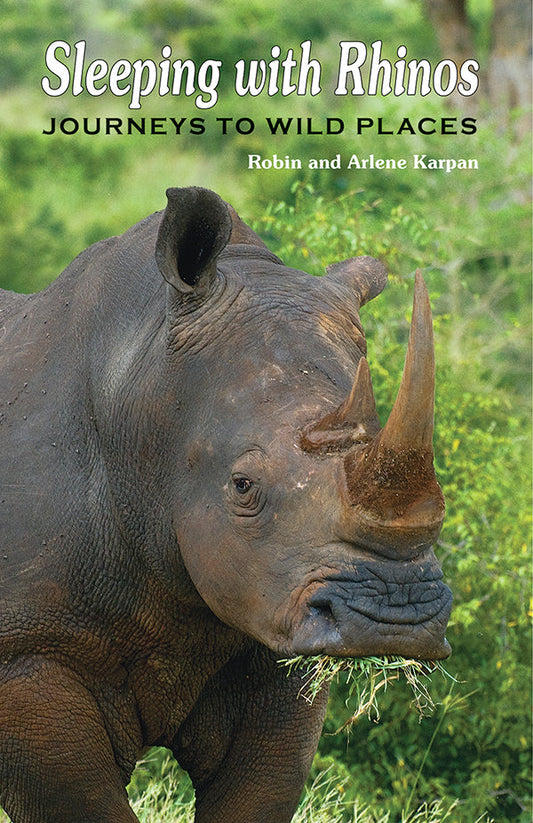 Sleeping With Rhinos - by Robin and Arlene Karpan (Parkland Publishing)
